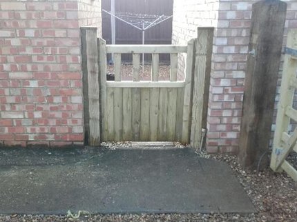 Small timber yard gate